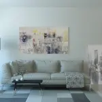 Luce e tessuti: come illuminare tende, divani e tappeti